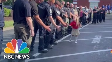 Dozens Of Officers And First Responders Welcome A 5-Year Old To Kindergarten