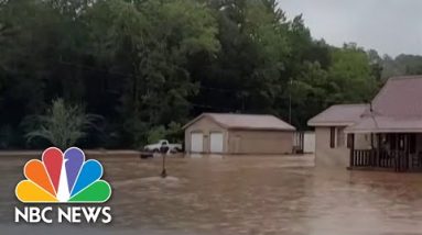 Georgia under flood alert after heavy rain while the West faces dangerous heat