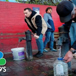 Kyiv Residents Fill Up Water Bottles After Russian Strikes Damage Infrastructure