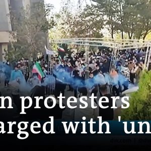 Iran vows tough stance on dissent in public trials | DW News