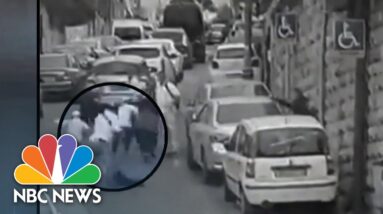 Israeli police say 13-year-old Palestinian boy shot Israeli father and son