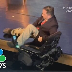 Lack of ramp forces Denver politician to crawl onto debate stage