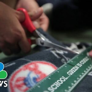 5th grade class making blankets for children in need