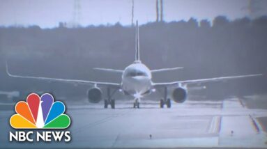 Man stabs flight attendant, tries to exit plane in midair attack