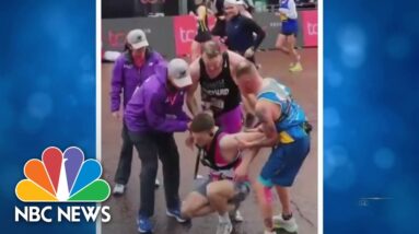 Paralympic athlete stops during London Marathon to help runner who collapsed