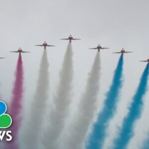King Charles III and Queen Camilla watch royal flyover from balcony