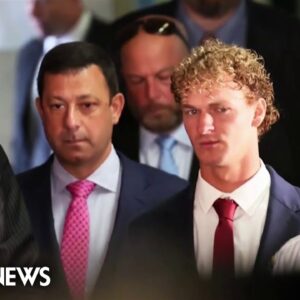 Marine veteran who choked a man on a subway pleads not guilty