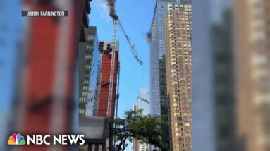 Crane catches fire and collapses onto NYC street