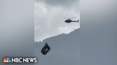 Pakistani students saved from dangling cable car