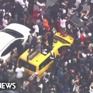 Watch: Massive crowd forms in NYC for game console giveaway