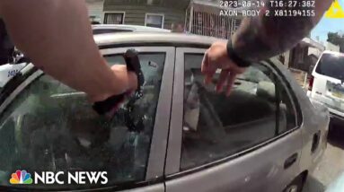 Philadelphia officer charged with murder after bodycam video shows him firing into car