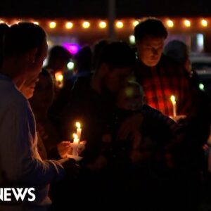 Lewiston residents honor victims of mass shooting during vigil
