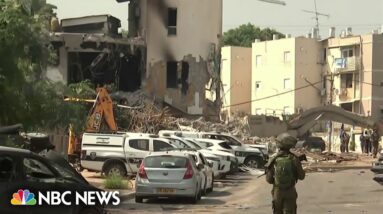 Hundreds of airstrikes bring buildings crashing in Gaza as gun battles rage in Israel