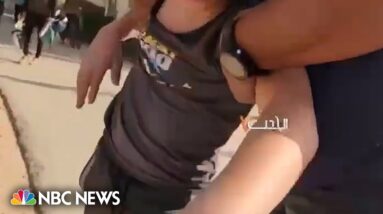 Video shows Hamas militants kidnapping 12-year-old boy