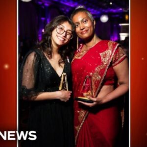 Duo matched through ‘Big Brothers Big Sisters’ singing together in Thanksgiving parade