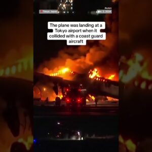 Hundreds of passengers escape burning plane in Japan
