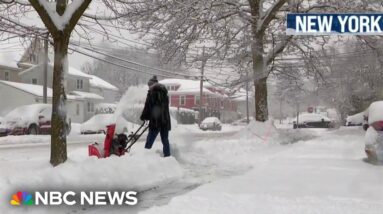 Heavy snow blankets parts of the Northeast, causing power outages and dangerous road conditions