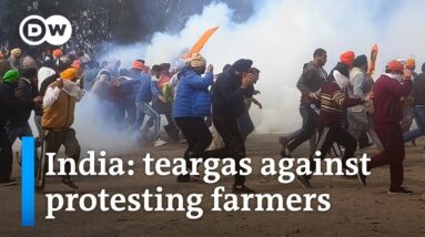 India: Farmers march on Delhi demanding guaranteed crop prices | DW News