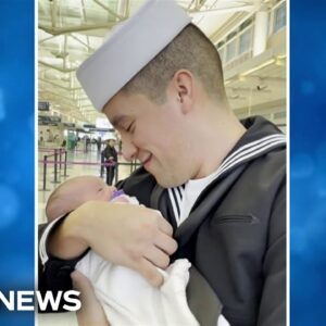 Navy sailor meets newborn daughter for first time in joyful moment