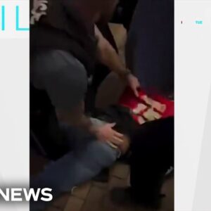 Video appears to show Kansas City police tackling woman