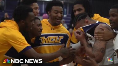 College coach surprises basketball player by flying in his family to see him play for the first time