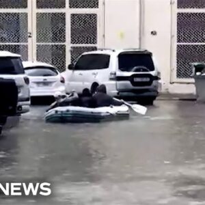 Dubai residents use boat to navigate flooded streets